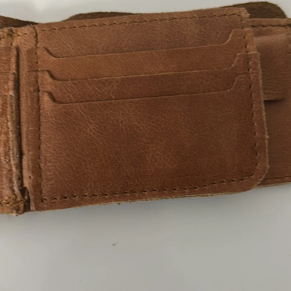 Brown Leather Bifold Wallet with Antelope Logo Rugged Safari-Inspired Style